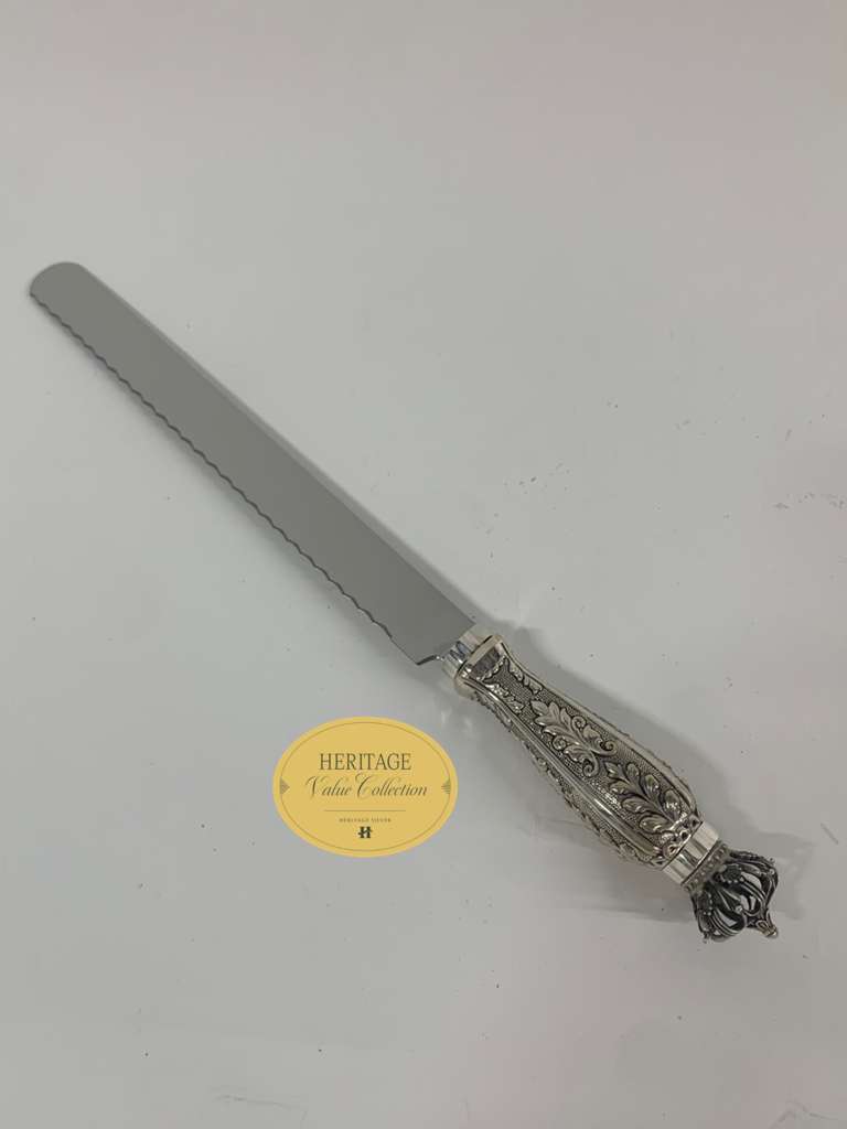 SERRATED CHASED KNIFE