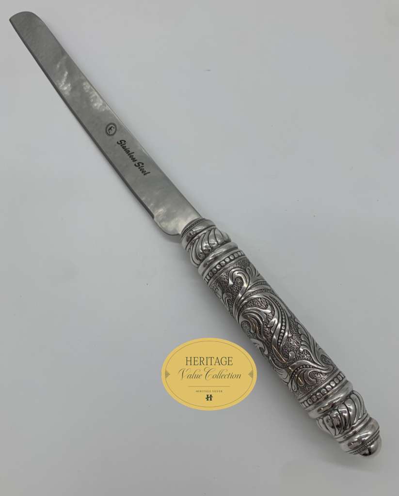 CHASED SERRATED KNIFE
