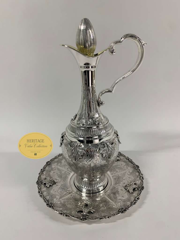 LARGE CHASED WINE PITCHER WITH TRAY